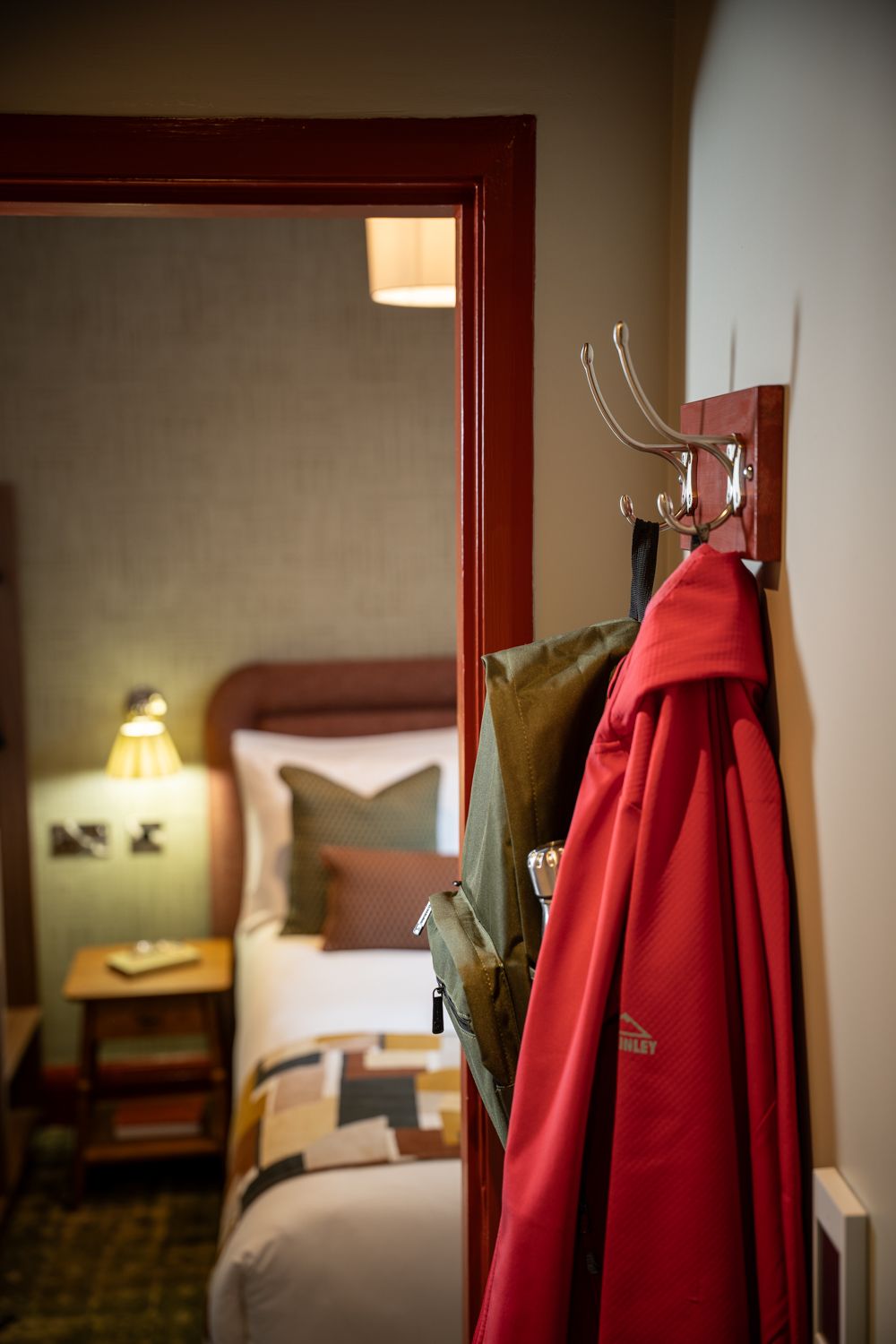 coat hooks in a family bedroom